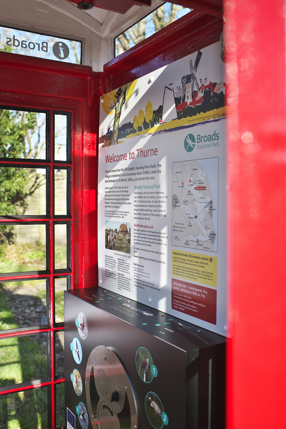 Renovated red phone box used as a Broads Tourist Information Centre
