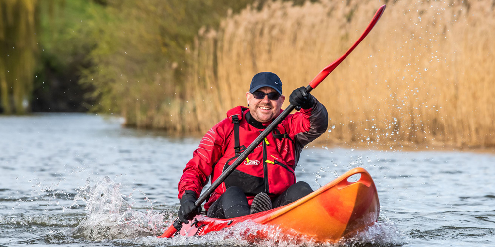 man kayaking on the river waveney at beccles