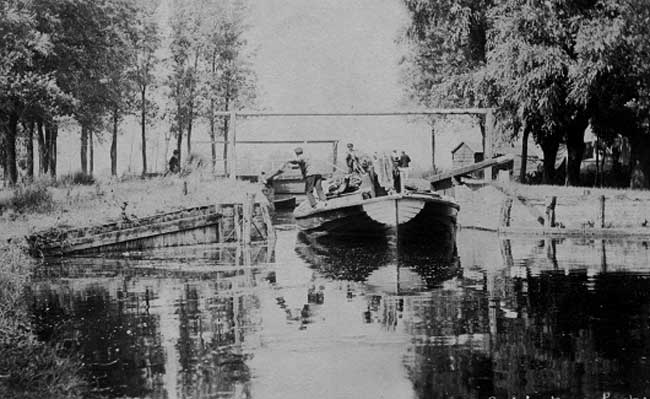 Old photo of a wherry leaving the lock