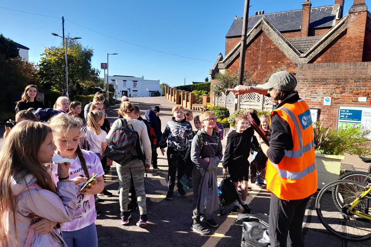 Broads Authority officer leads a group of children learning about the history of Reedham