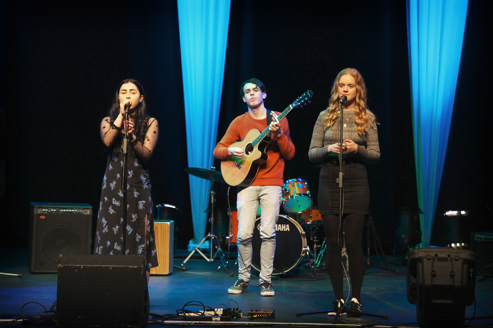 Students perform the second broads album